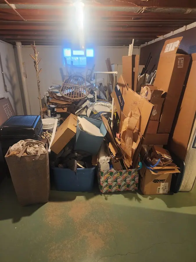 Roll-off dumpster container at job site for Concrete Dumpster Rental in Glen Raven